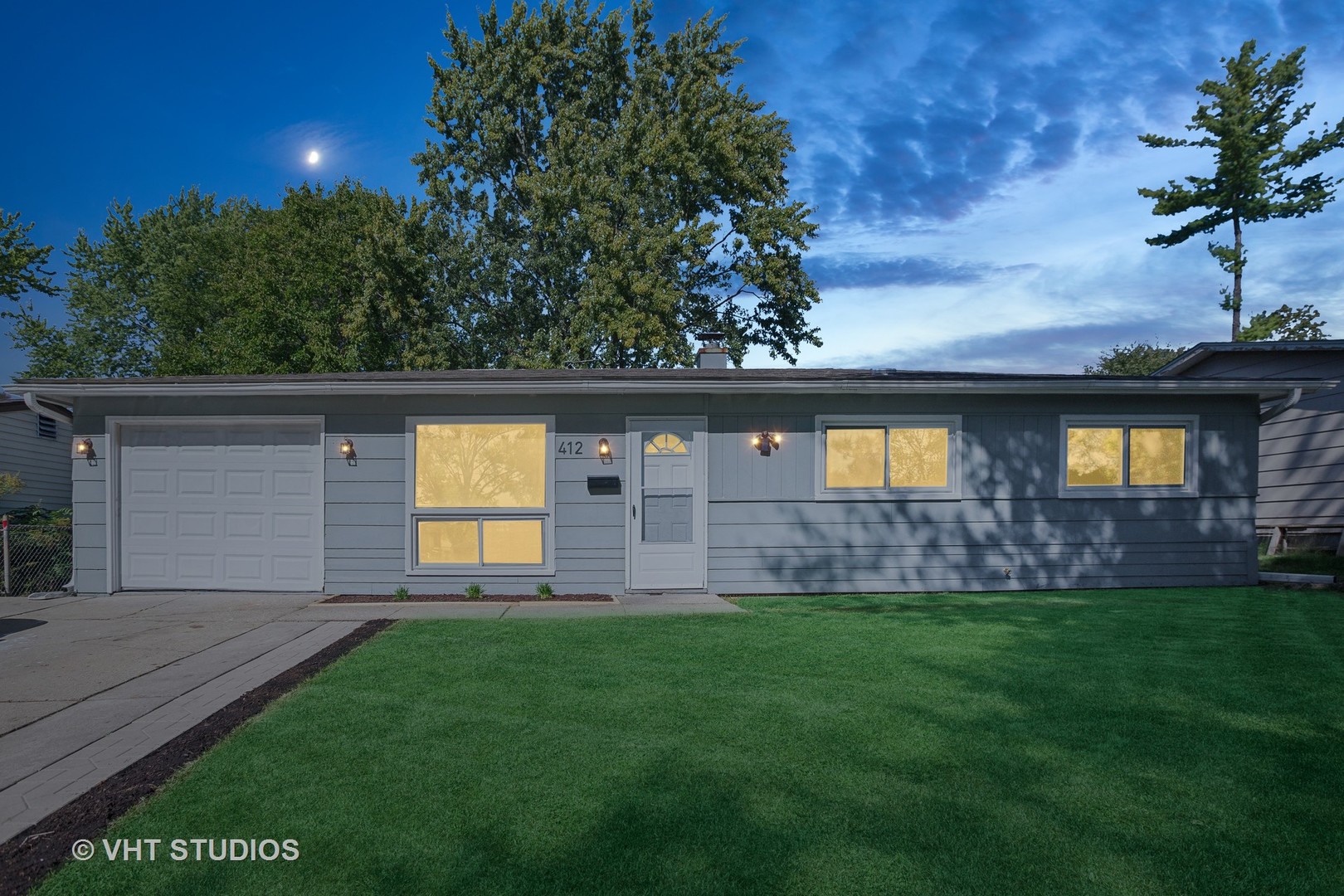 412 Cahill Road Streamwood, IL 60107 - Photo 2 of 16 a view front of house with a yard