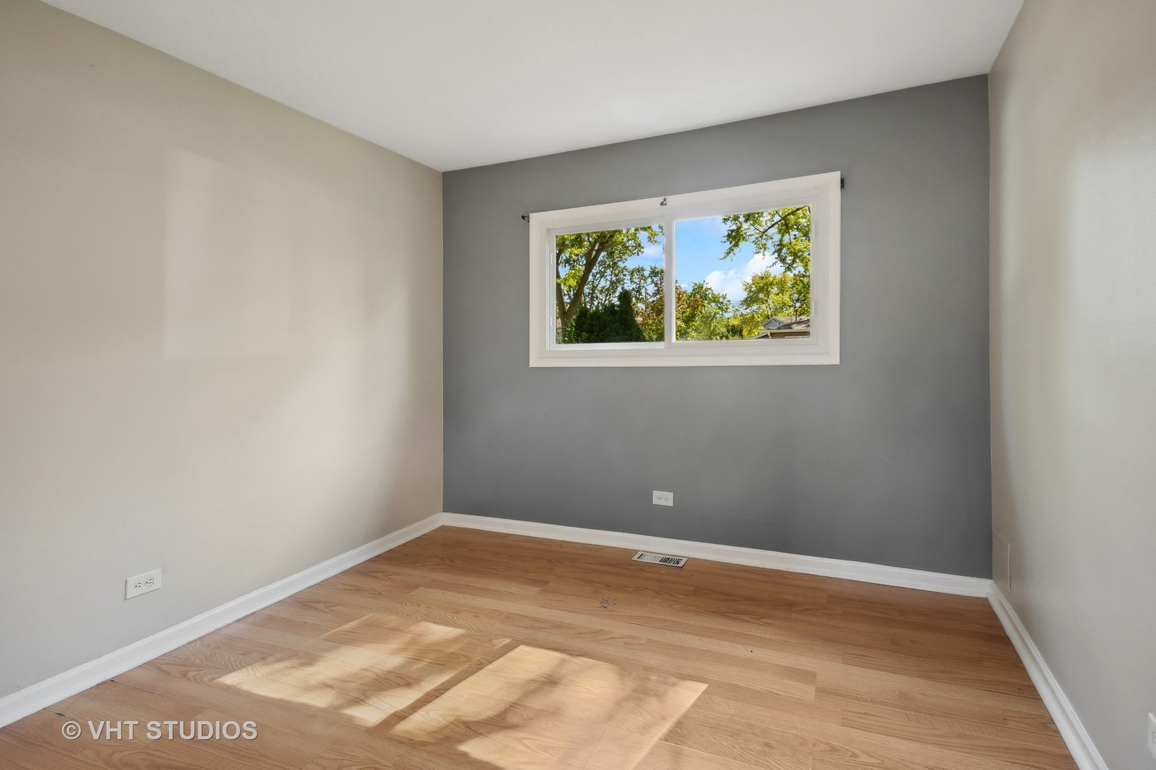 412 Cahill Road Streamwood, IL 60107 - Photo 9 of 16 a view of room with window and air conditioner