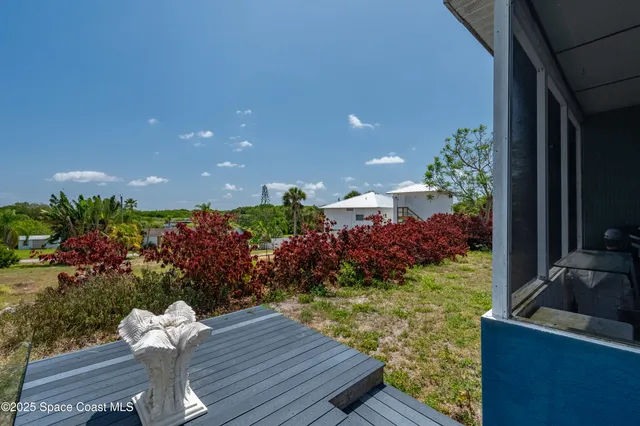 a view of yard from outdoor seating