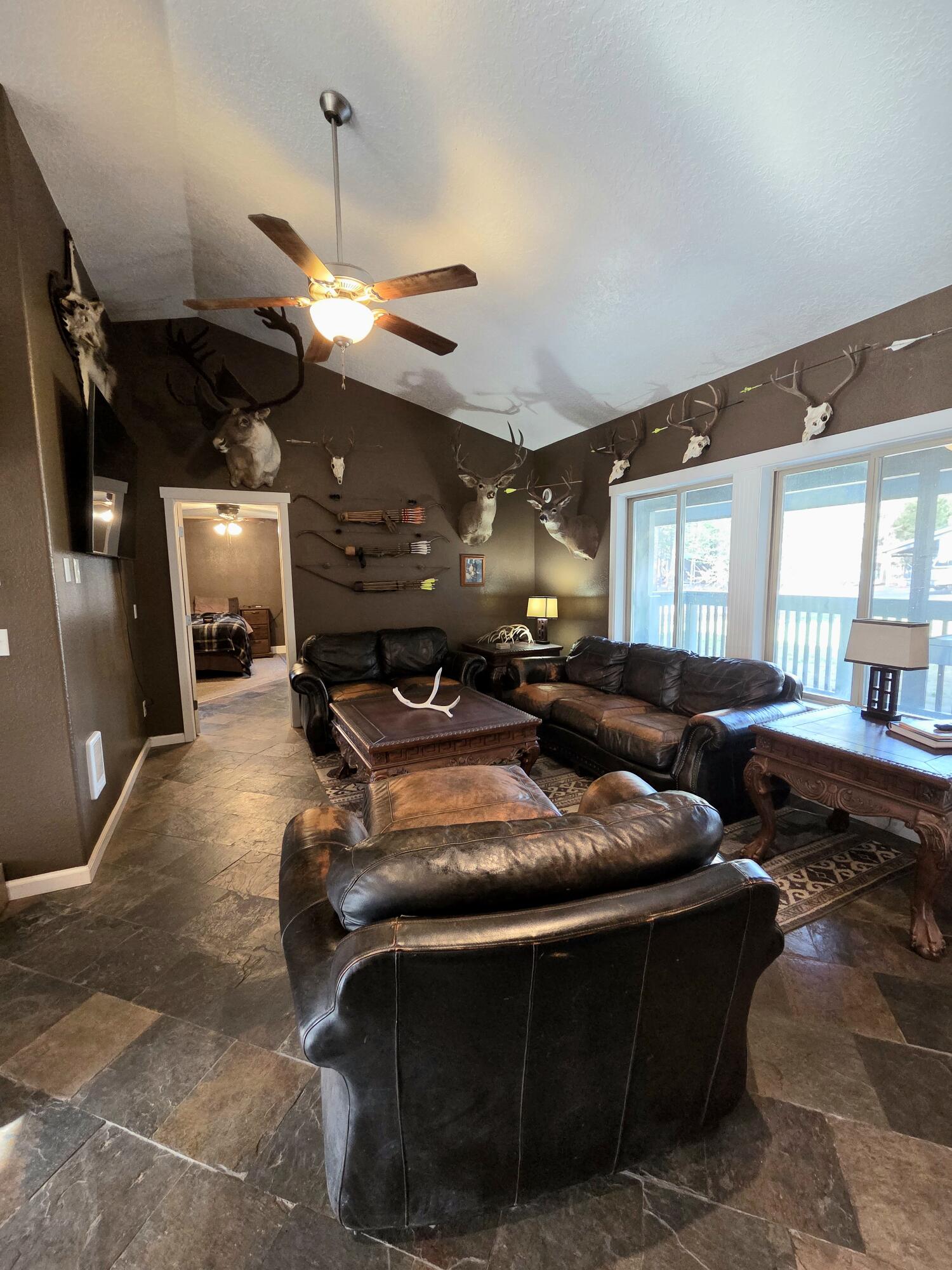 53156 Day Road La Pine, OR 97739 - Photo 14 of 28 another view of living space with ceiling/light fam