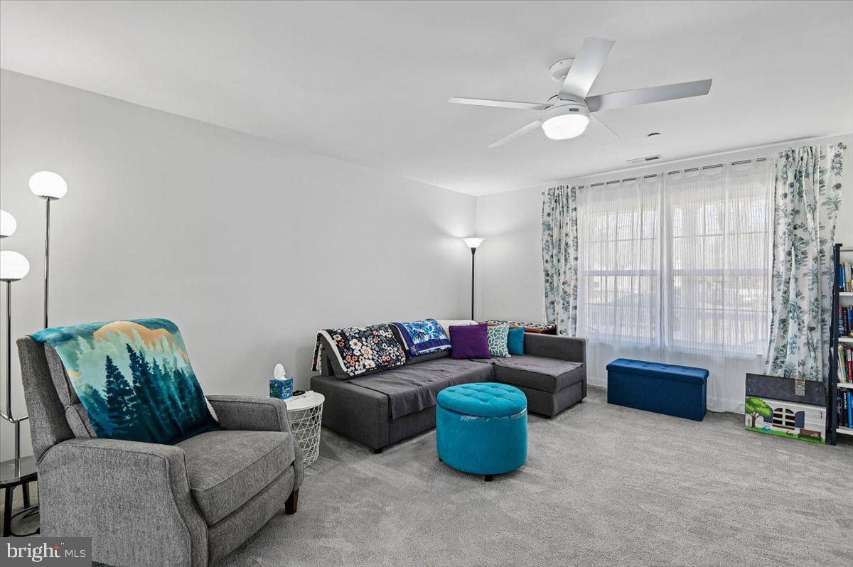1237 A Juniper Street Shady Side, MD 20764 - Photo 9 of 31 Lots Of Natural Sunlight in the Living Room