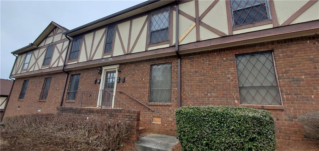 a view of a house with a street