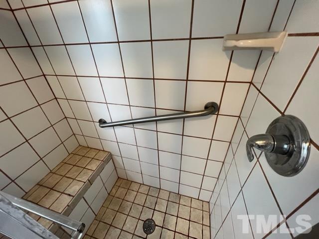 301 North 16th Street Erwin, NC 28339 - Photo 16 of 21 a bathroom with a shower