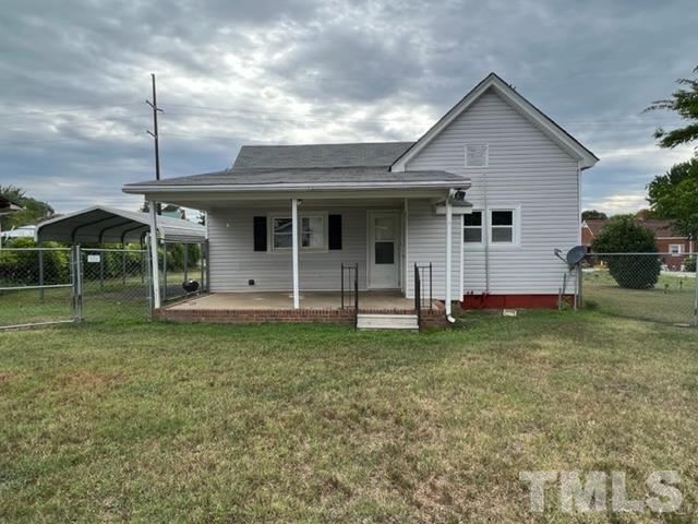 301 North 16th Street Erwin, NC 28339 - Photo 17 of 21 a view of a house with backyard