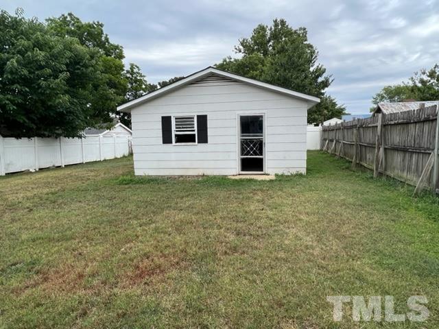 301 North 16th Street Erwin, NC 28339 - Photo 19 of 21 a view of a backyard with a garden