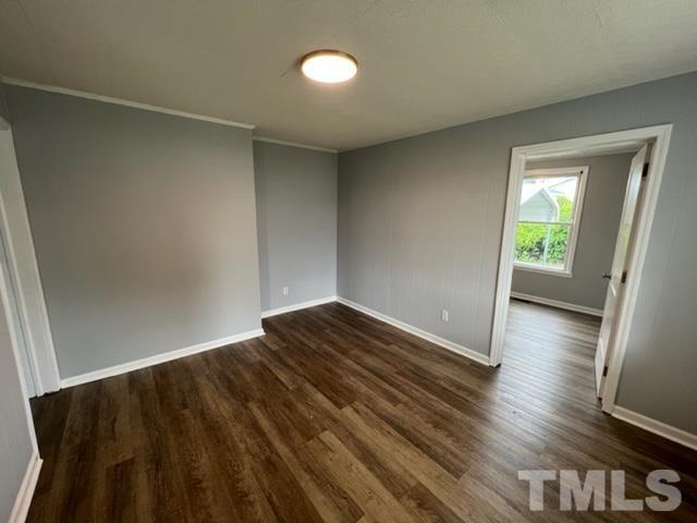 301 North 16th Street Erwin, NC 28339 - Photo 10 of 21 a view of wooden floor and windows in a room