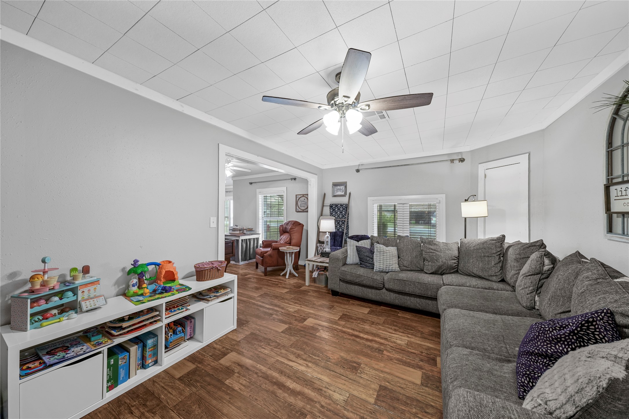3027 Poppy Street Needville, TX 77461 - Photo 11 of 41 a living room with furniture kitchen view and a window