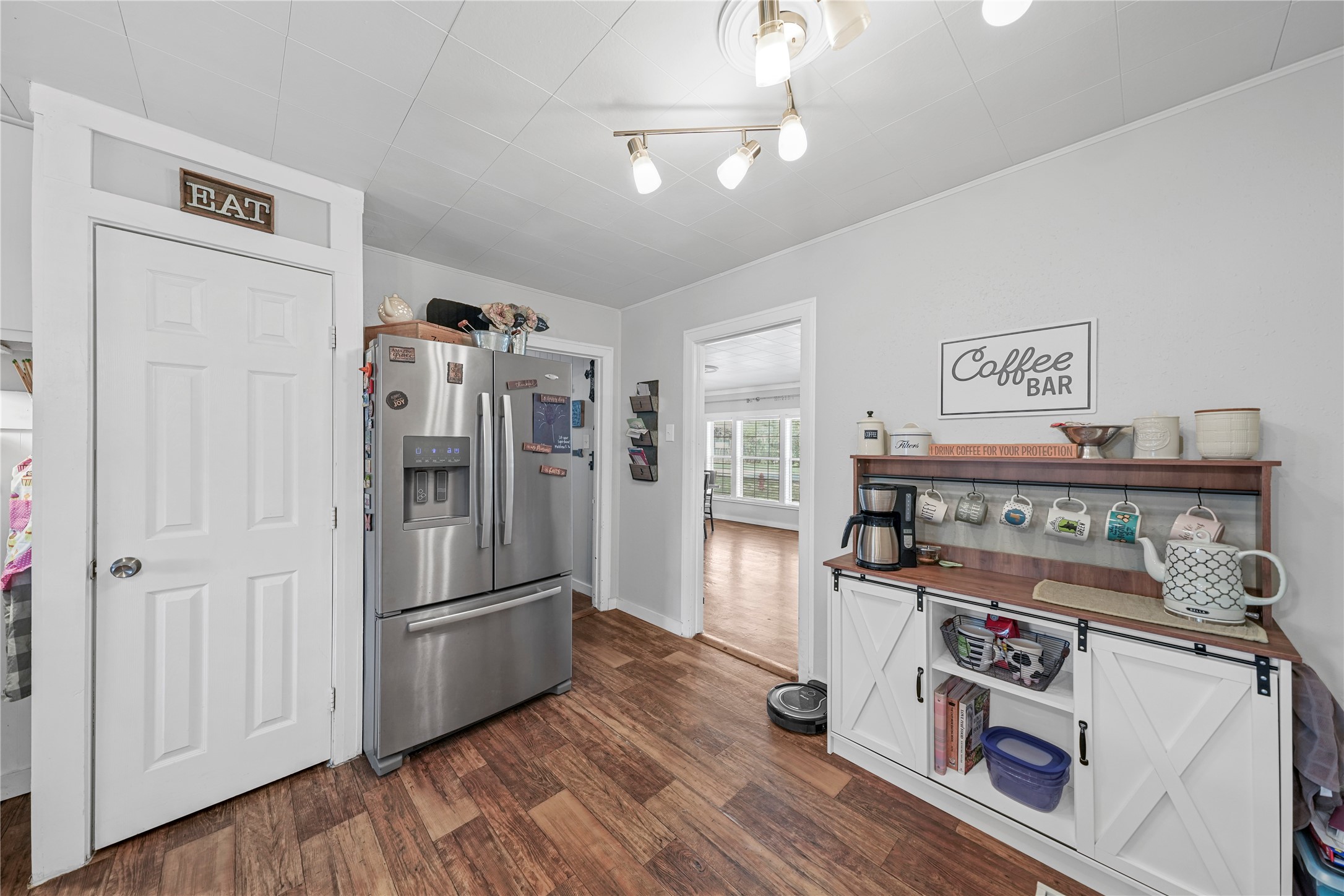3027 Poppy Street Needville, TX 77461 - Photo 17 of 41 a kitchen with stainless steel appliances granite countertop a refrigerator and a stove top oven