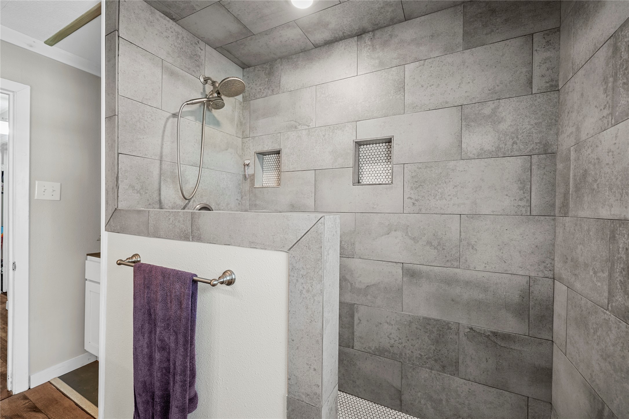3027 Poppy Street Needville, TX 77461 - Photo 19 of 41 a bathroom with a bathtub and a shower