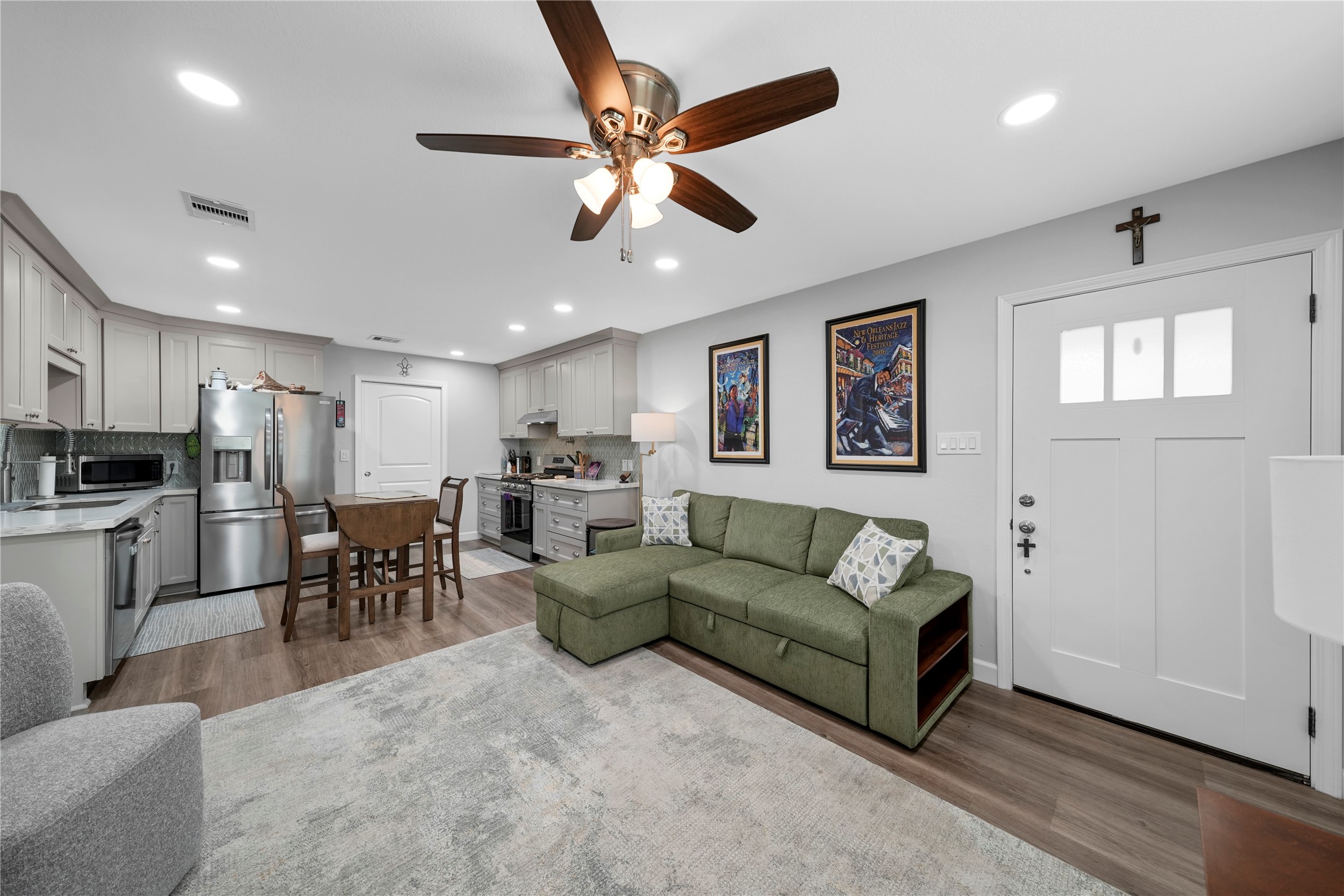 3027 Poppy Street Needville, TX 77461 - Photo 32 of 41 a living room with furniture kitchen area and a window