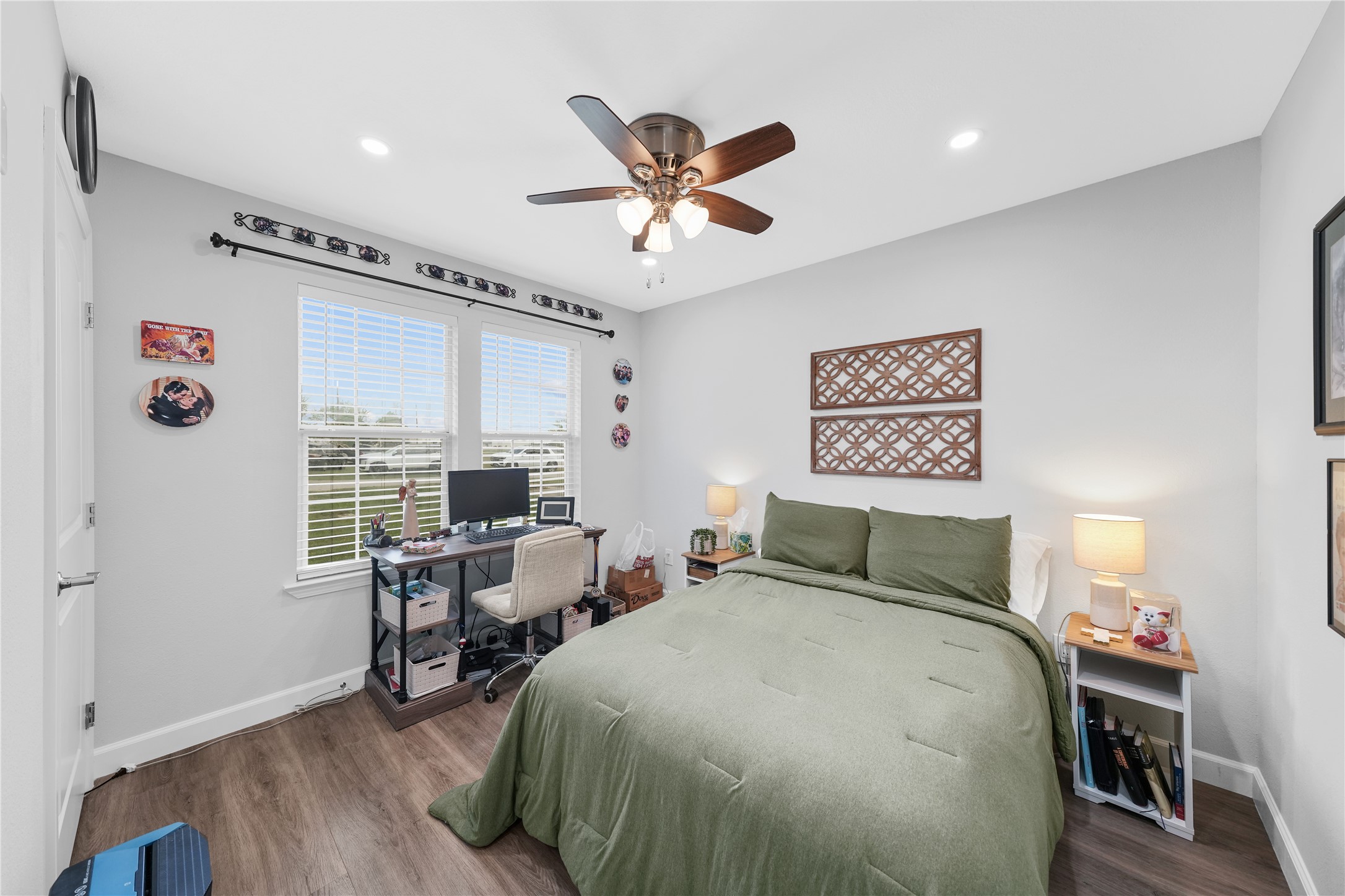 3027 Poppy Street Needville, TX 77461 - Photo 37 of 41 a bedroom with a bed and wooden floor