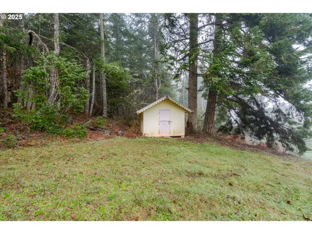 a house with trees in the background