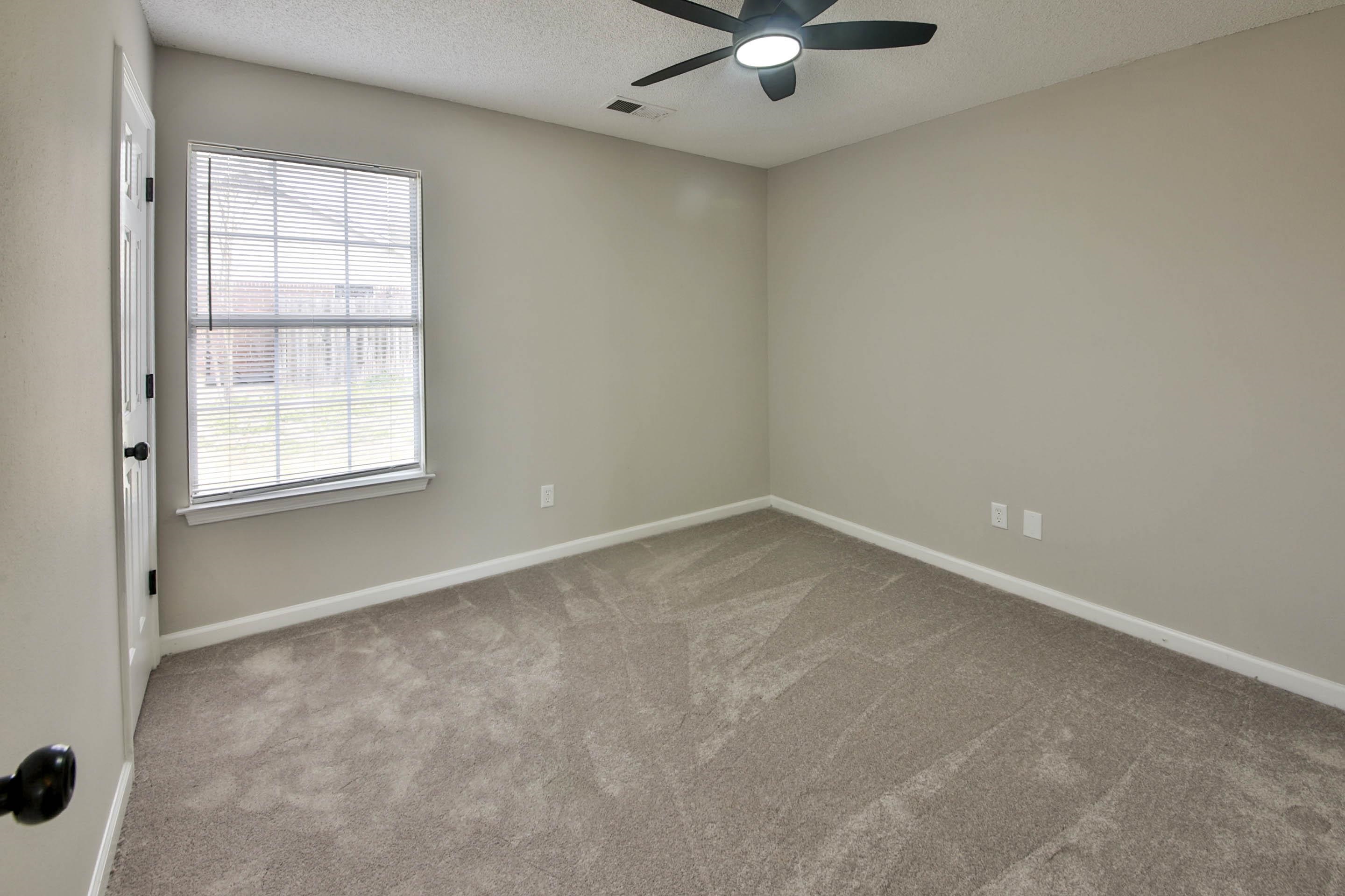 125 Pine Ridge Lane Oakland, TN 38060 - Photo 15 of 24 Unfurnished room featuring light colored carpet, a ceiling fan, and a textured ceiling