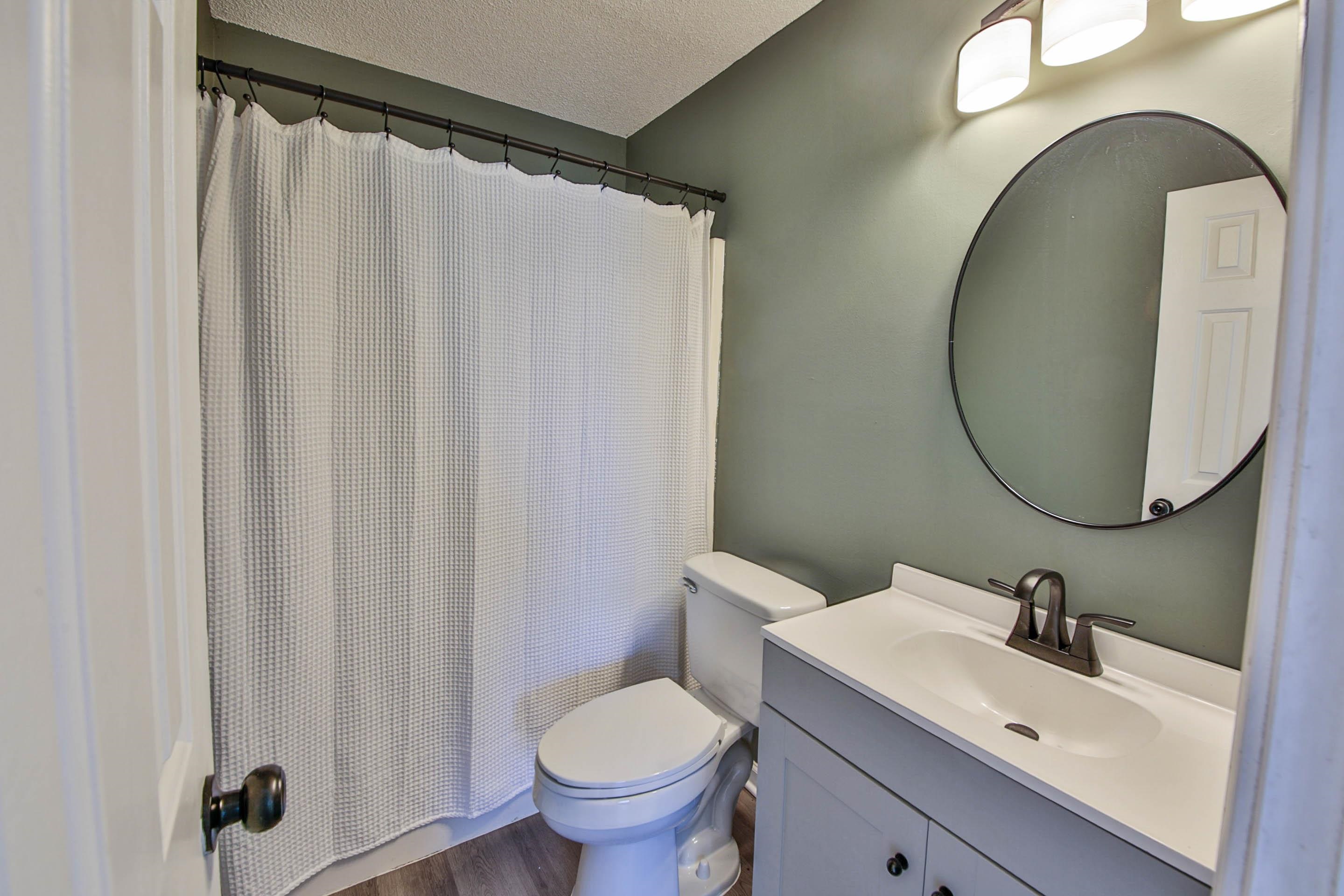 125 Pine Ridge Lane Oakland, TN 38060 - Photo 17 of 24 Bathroom featuring vanity, a textured ceiling, and dark wood-style floors