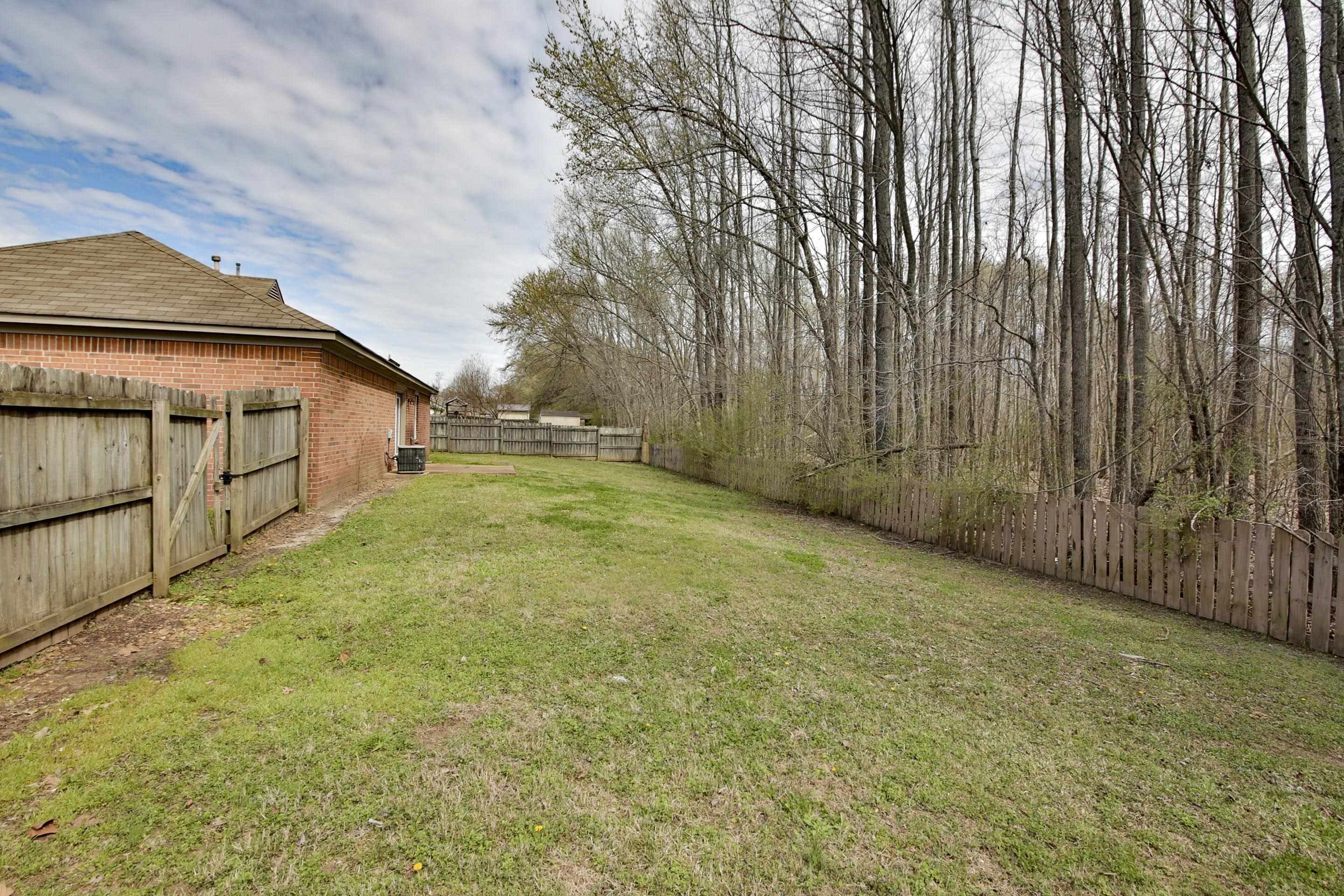 125 Pine Ridge Lane Oakland, TN 38060 - Photo 21 of 24 View of fenced backyard
