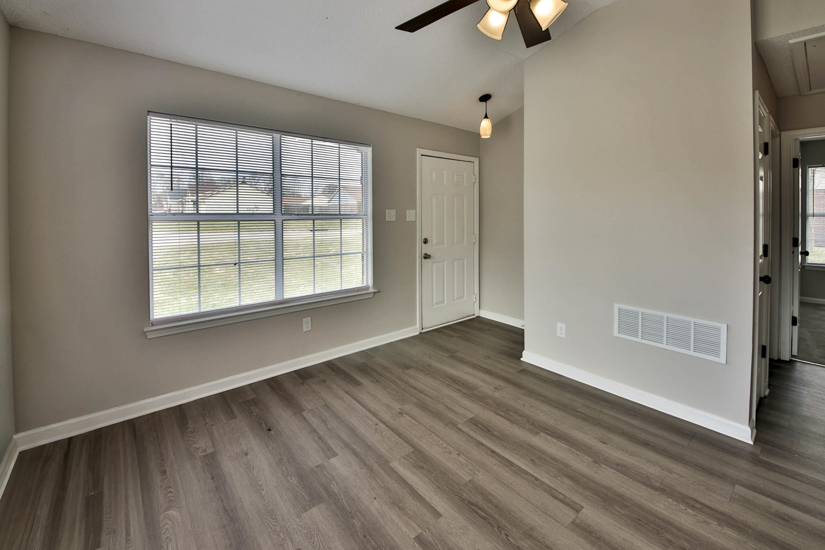 125 Pine Ridge Lane Oakland, TN 38060 - Photo 4 of 24 Foyer with a ceiling fan, vaulted ceiling, dark wood finished floors, and healthy amount of natural light