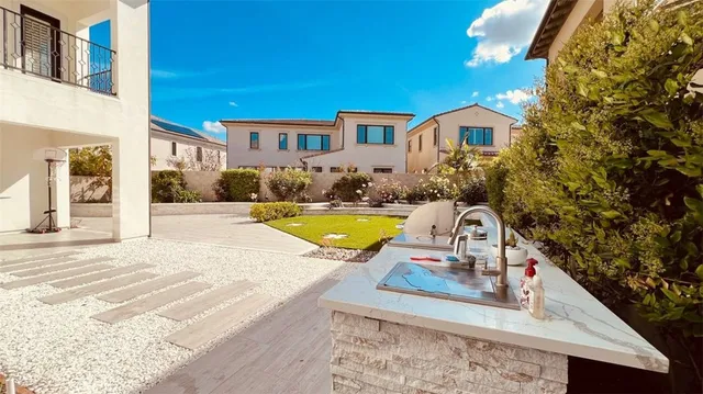 a view of a house with swimming pool