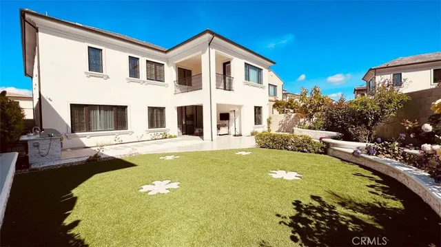 a front view of a house with swimming pool