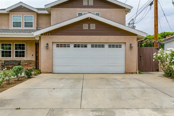 a view of a house with garage