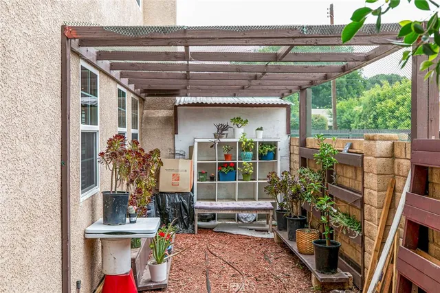 a front view of house with outdoor seating