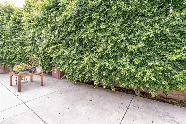a view of backyard with a table and chair