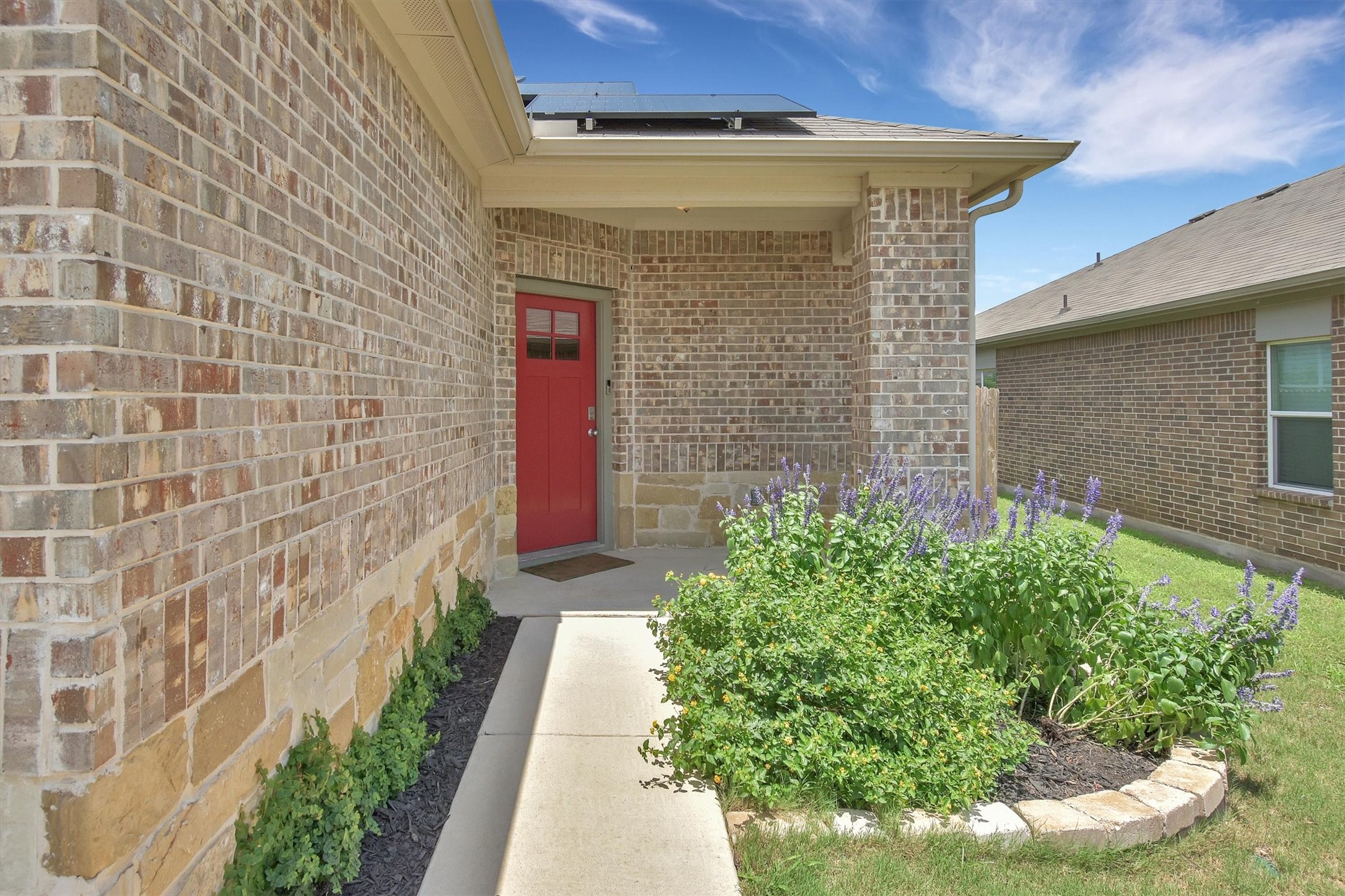 324 Shiner Lane Georgetown, TX 78626 - Photo 2 of 39 a view of brick wall with potted plants