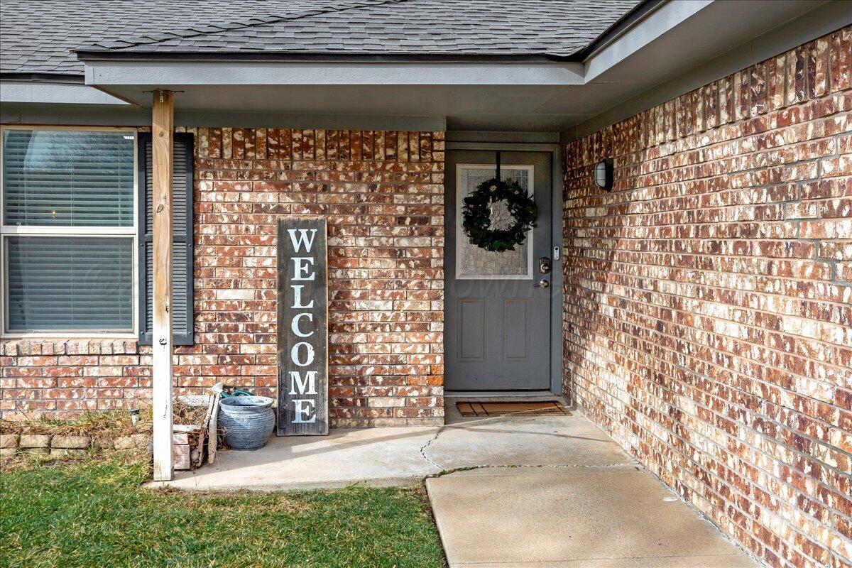 6912 Manor Circle Amarillo, TX 79109 - Photo 2 of 25 a view of a door and an outdoor space
