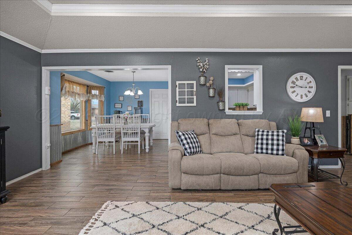 6912 Manor Circle Amarillo, TX 79109 - Photo 7 of 25 a living room with furniture and a table