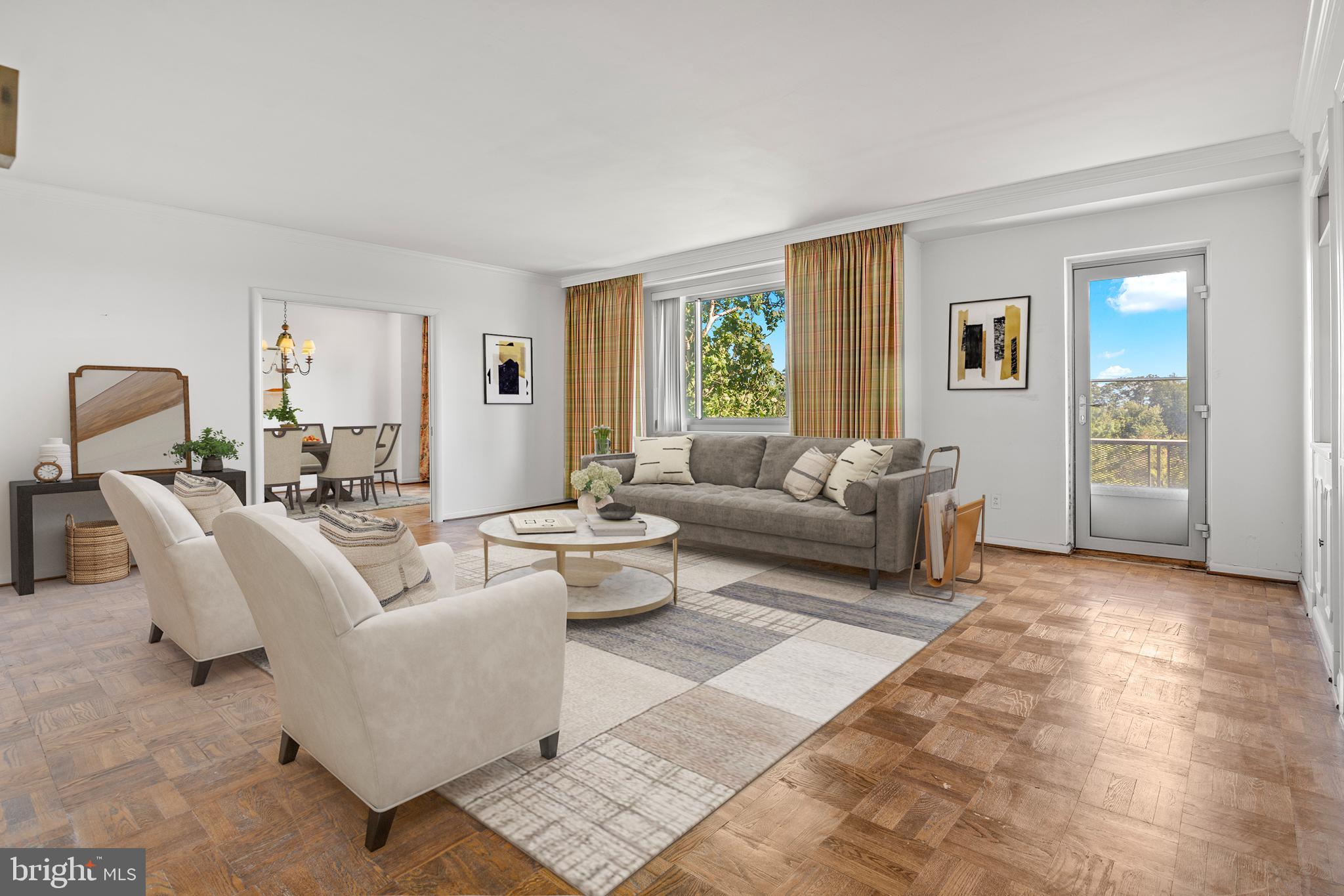 11 Slade Avenue, Unit 712 Baltimore, MD 21208 - Photo 8 of 30 a living room with furniture and a large window