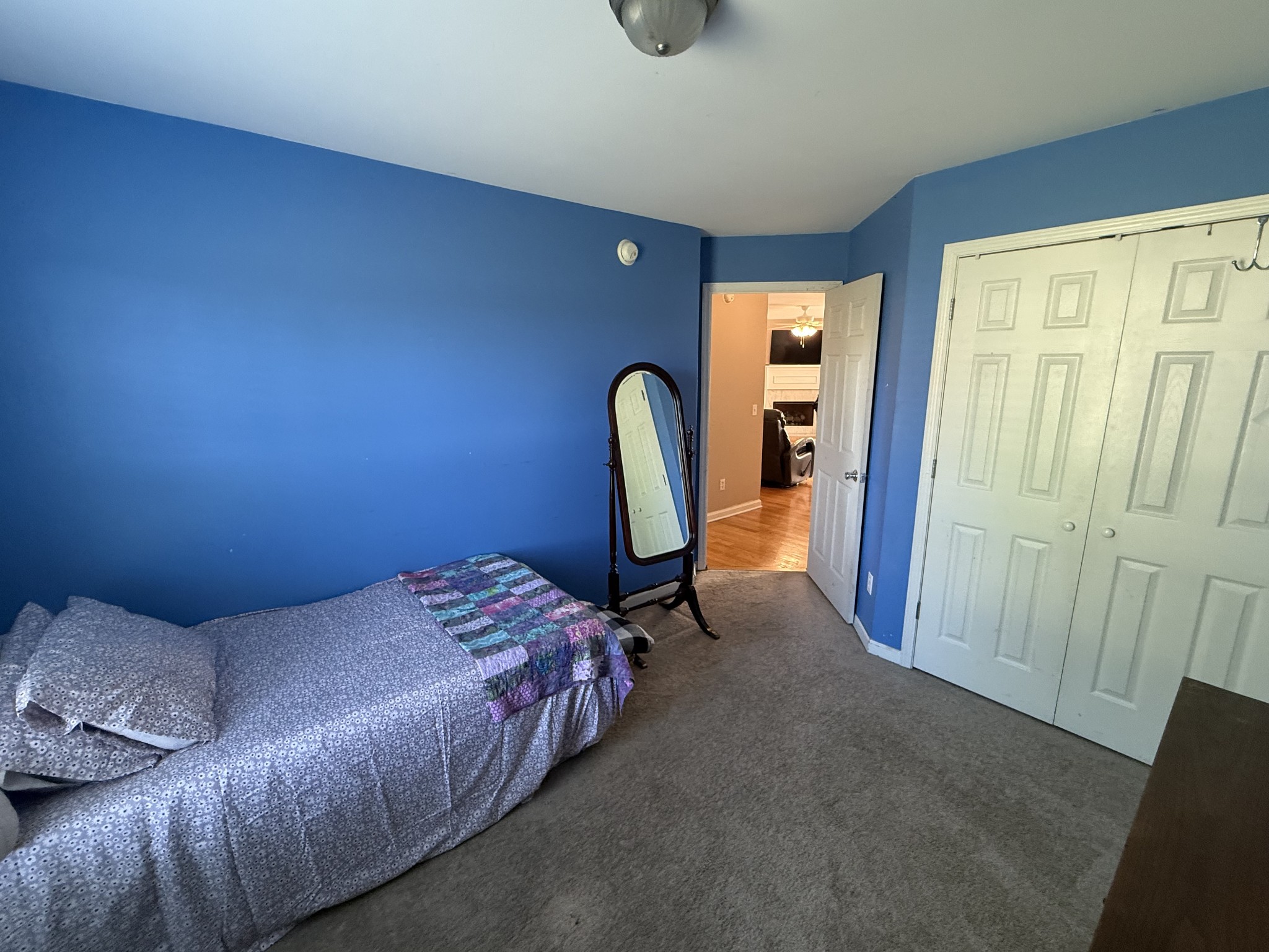 1702 Abiff Road Burns, TN 37029 - Photo 27 of 47 a bedroom with a bed a desk and chair