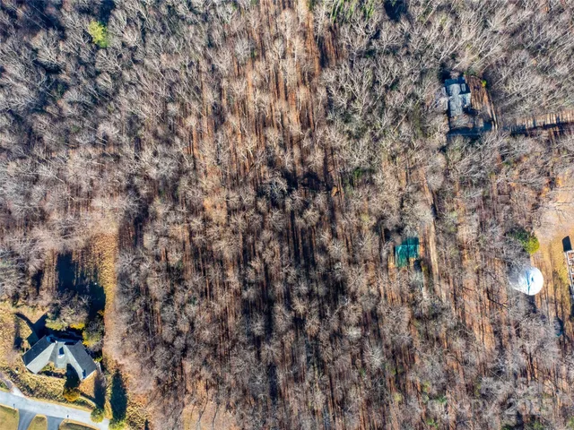 an aerial view of a city with lots of residential buildings