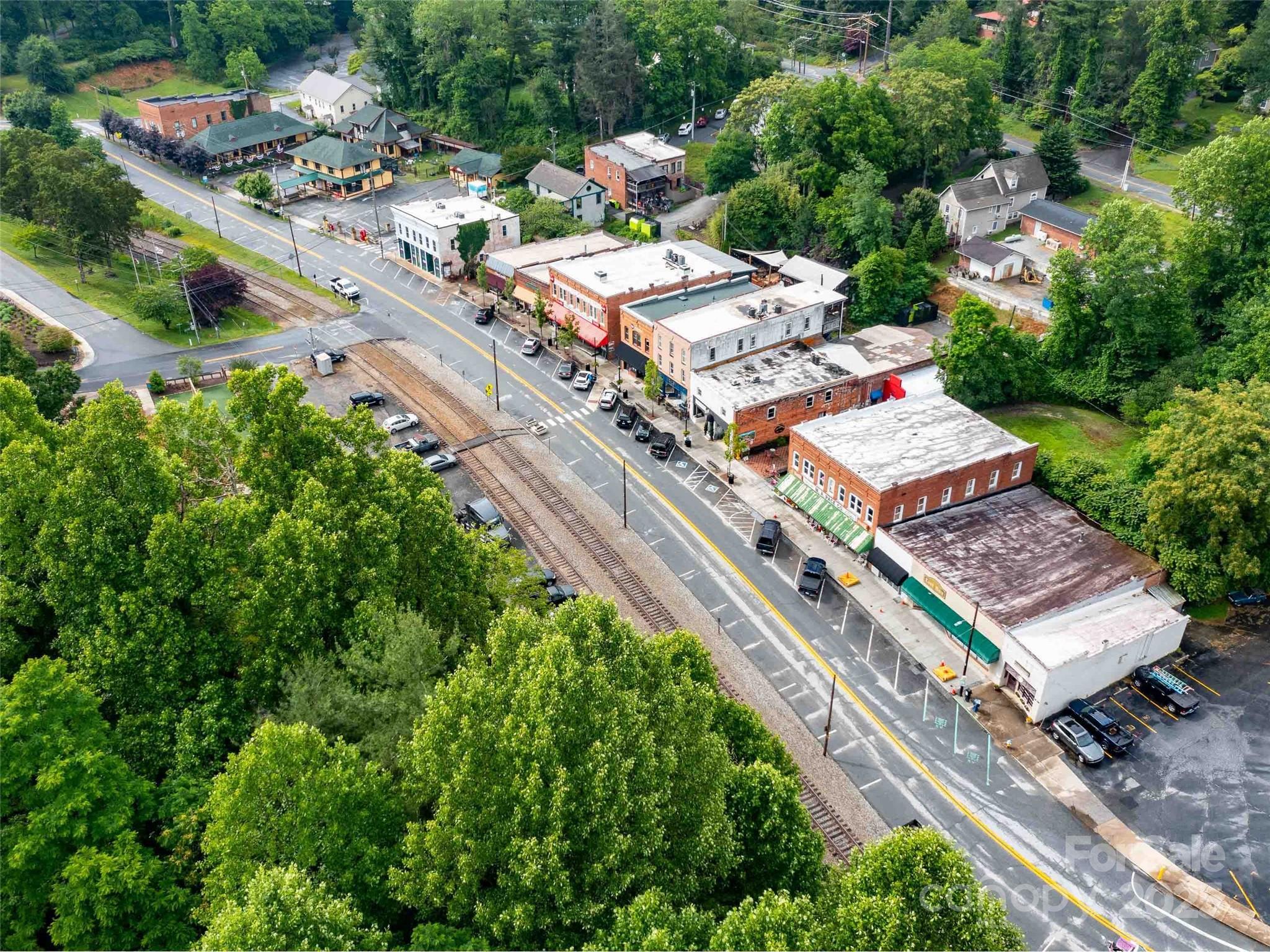 0 Mountain Page Road, Unit 17 18 19 Saluda, NC 28773 - Photo 35 of 42 an aerial view of a house with a garden