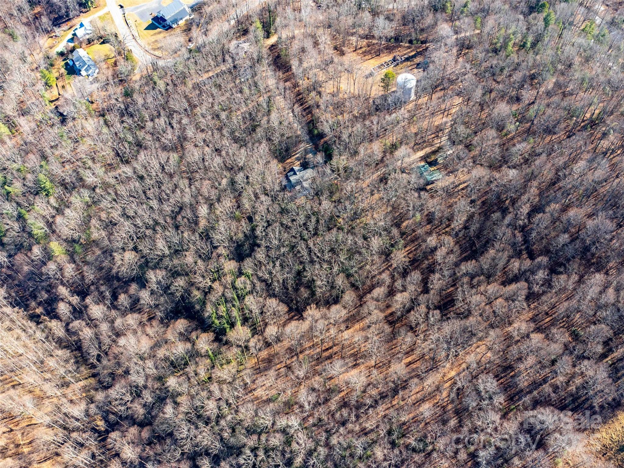 0 Mountain Page Road, Unit 17 18 19 Saluda, NC 28773 - Photo 7 of 42 a view of a house with a tree