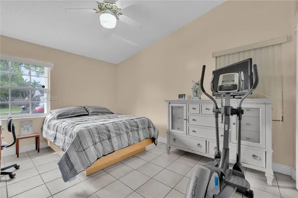 a bedroom with a bed and a cabinets