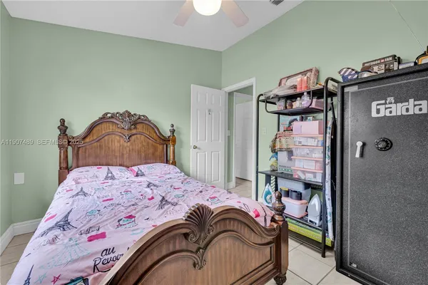 a bedroom with a bed and a closet