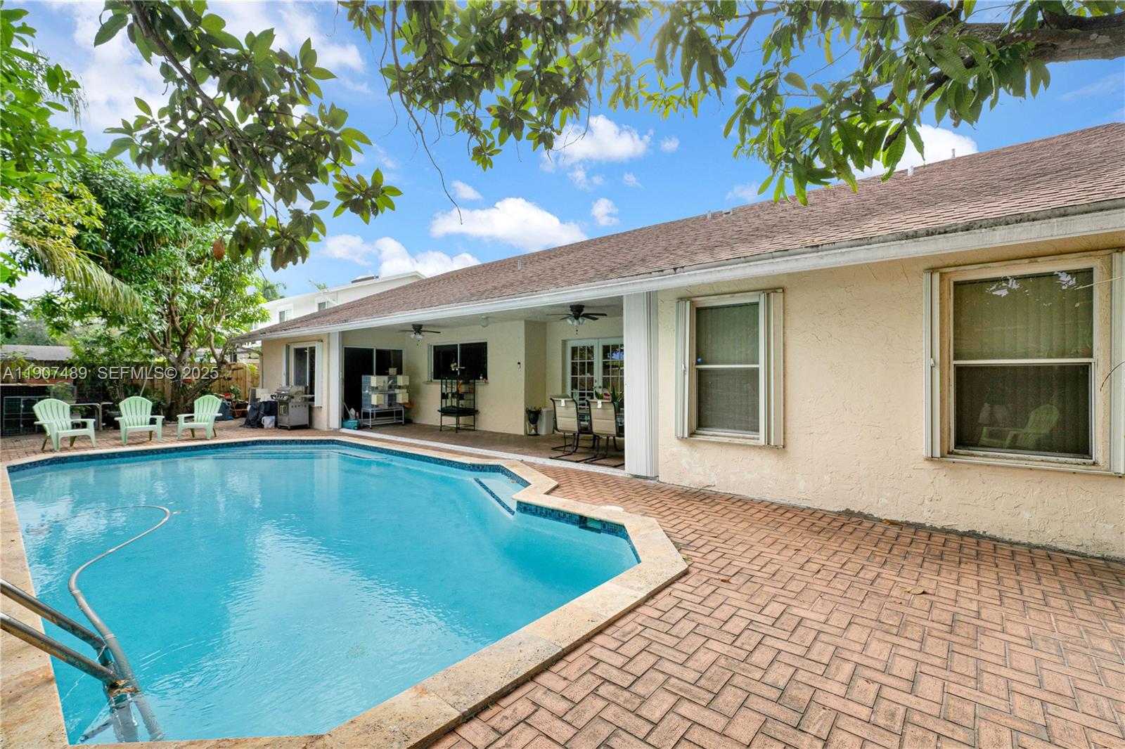 11041 Southwest 138th Avenue Miami, FL 33186 - Photo 32 of 33 a view of a house with swimming pool