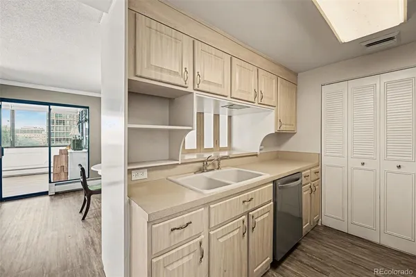 a kitchen with a sink and cabinets