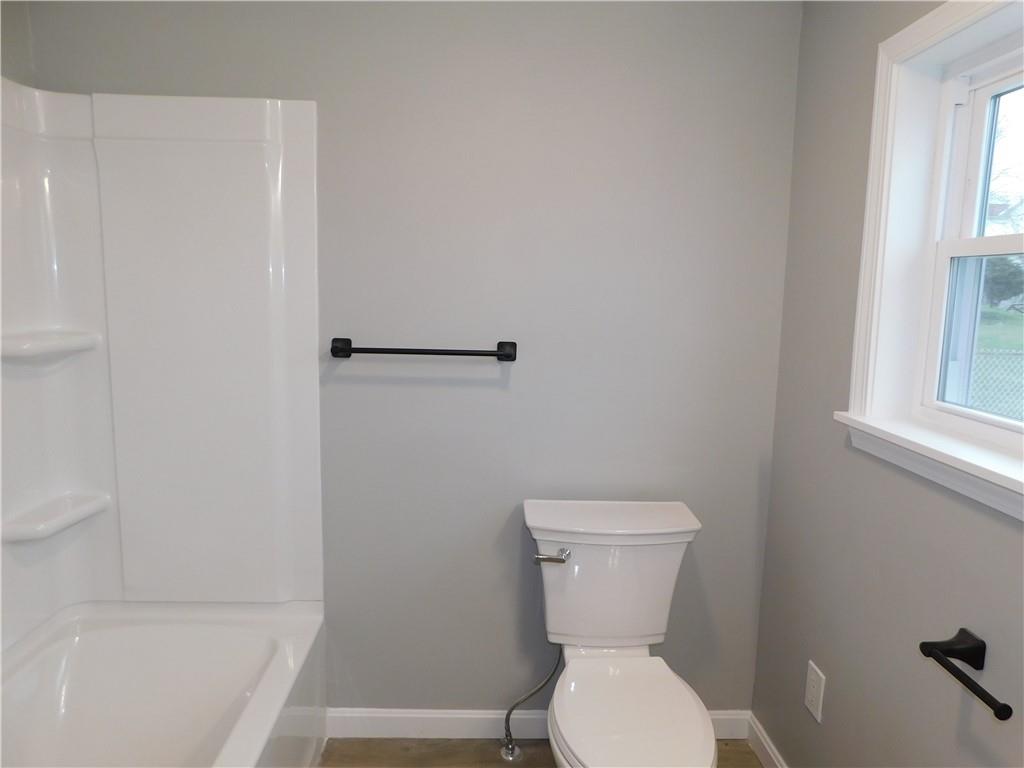 408 3rd Street Allison, PA 15413 - Photo 15 of 40 a bathroom with a toilet and a bathtub