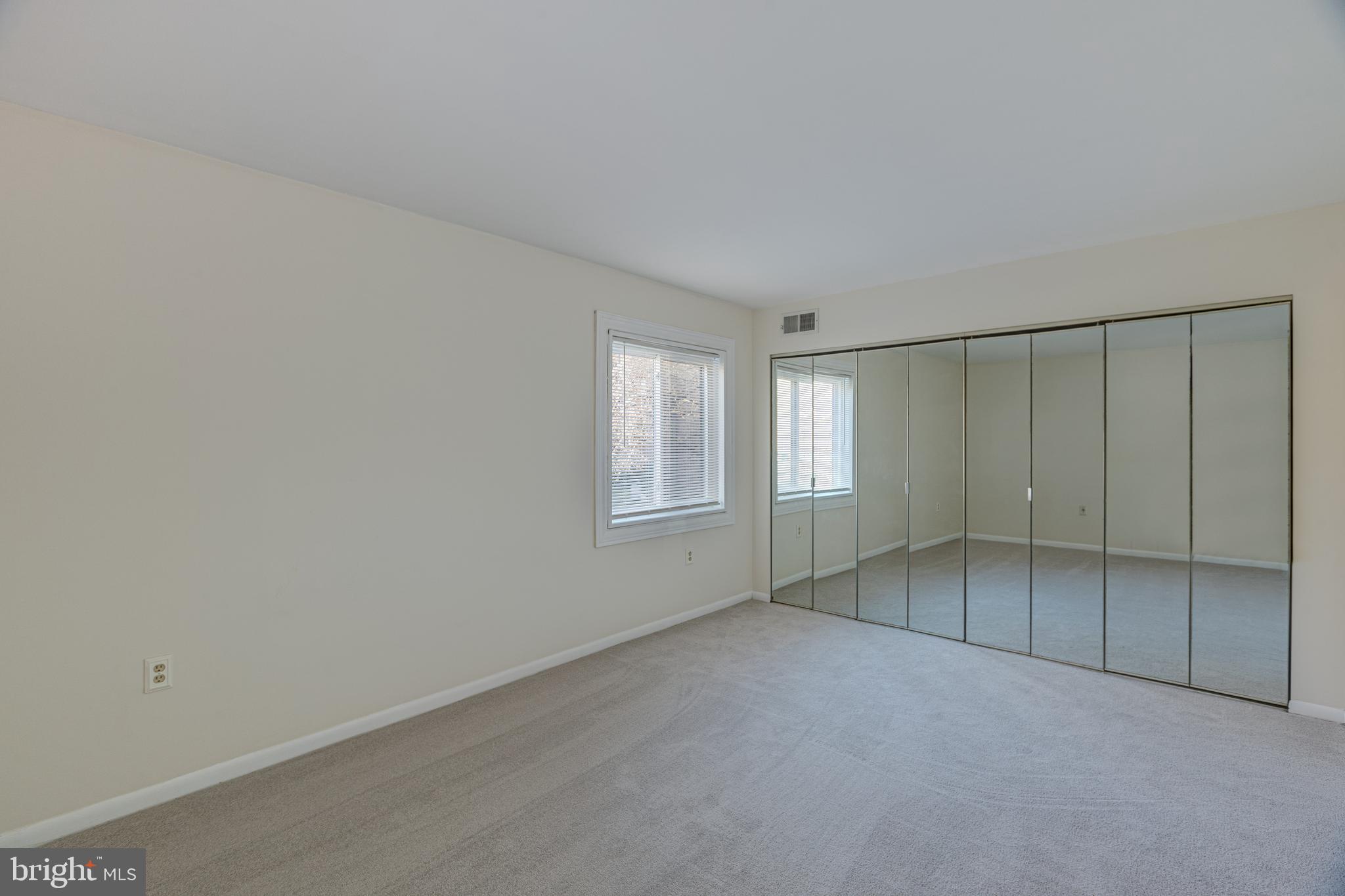 1536 Northgate Square, Unit 12A Reston, VA 20190 - Photo 23 of 30 Large Bedroom w/Mirrored Closet