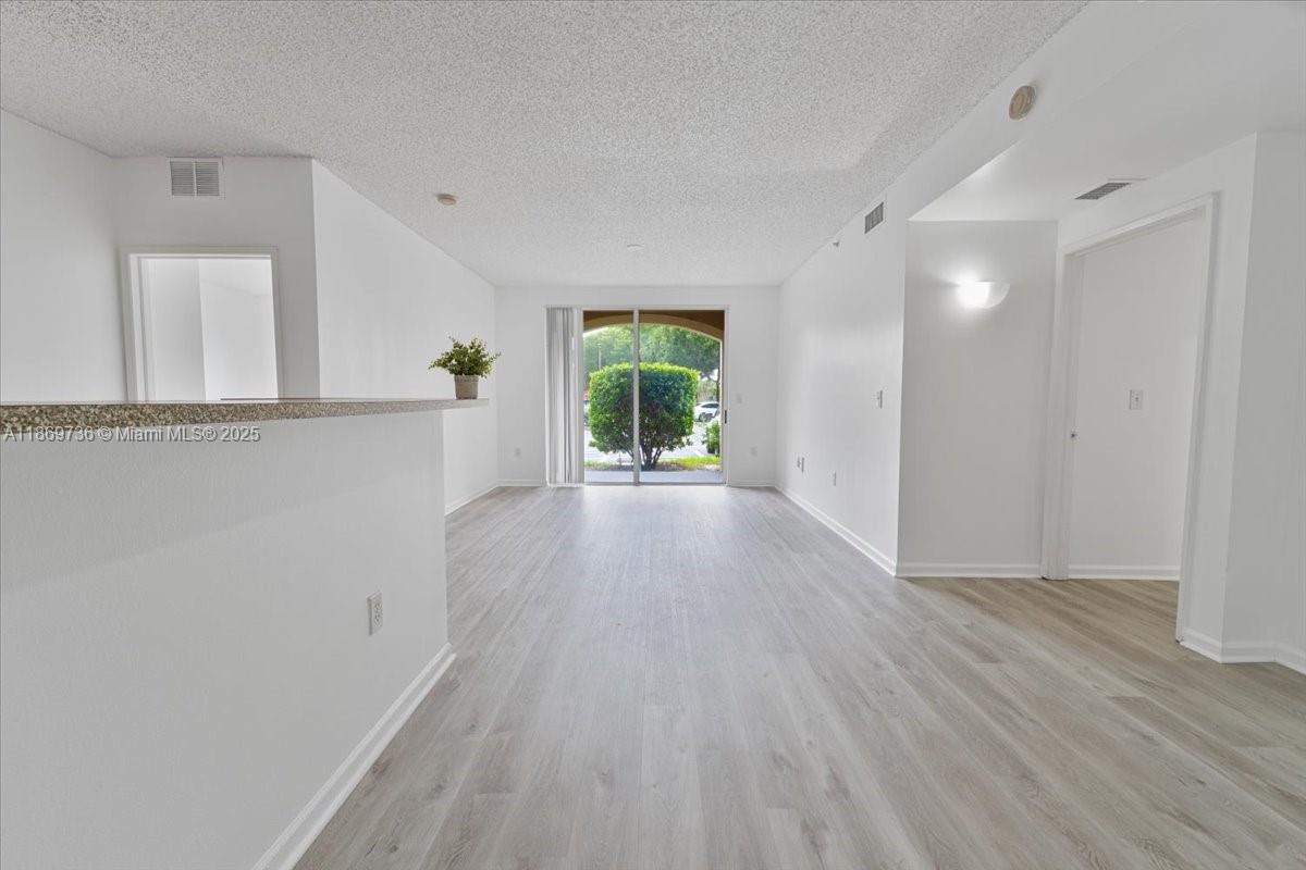 7910 North Nob Hill Road, Unit 105 Tamarac, FL 33321 - Photo 2 of 31