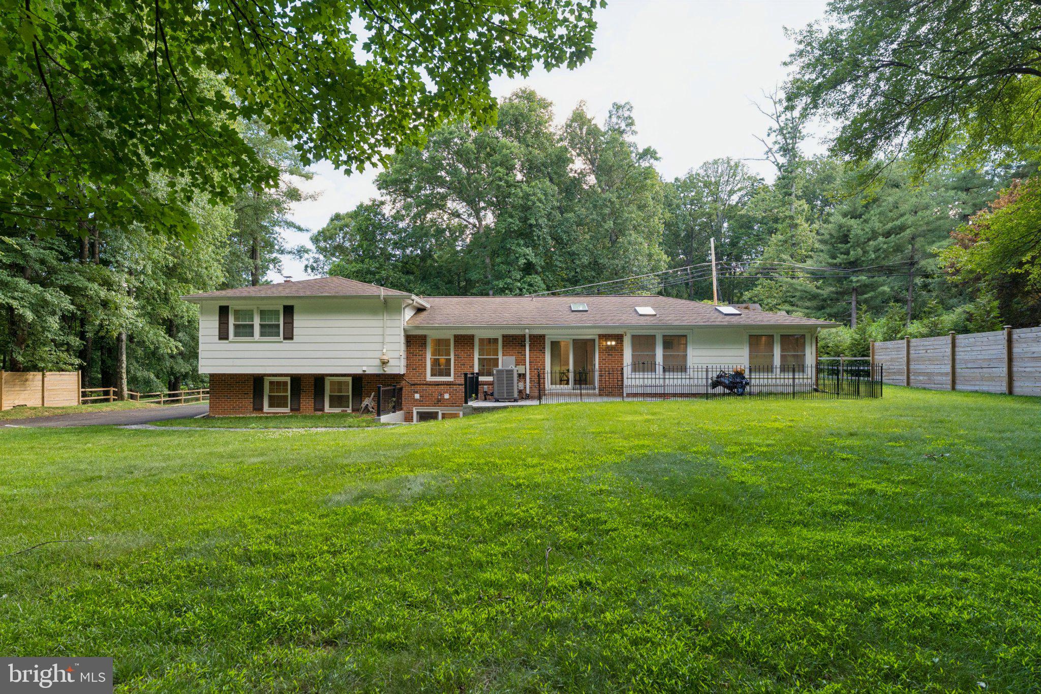 3219 Fox Mill Road Oakton, VA 22124 - Photo 66 of 87 Charming home nestled in lush greenery.