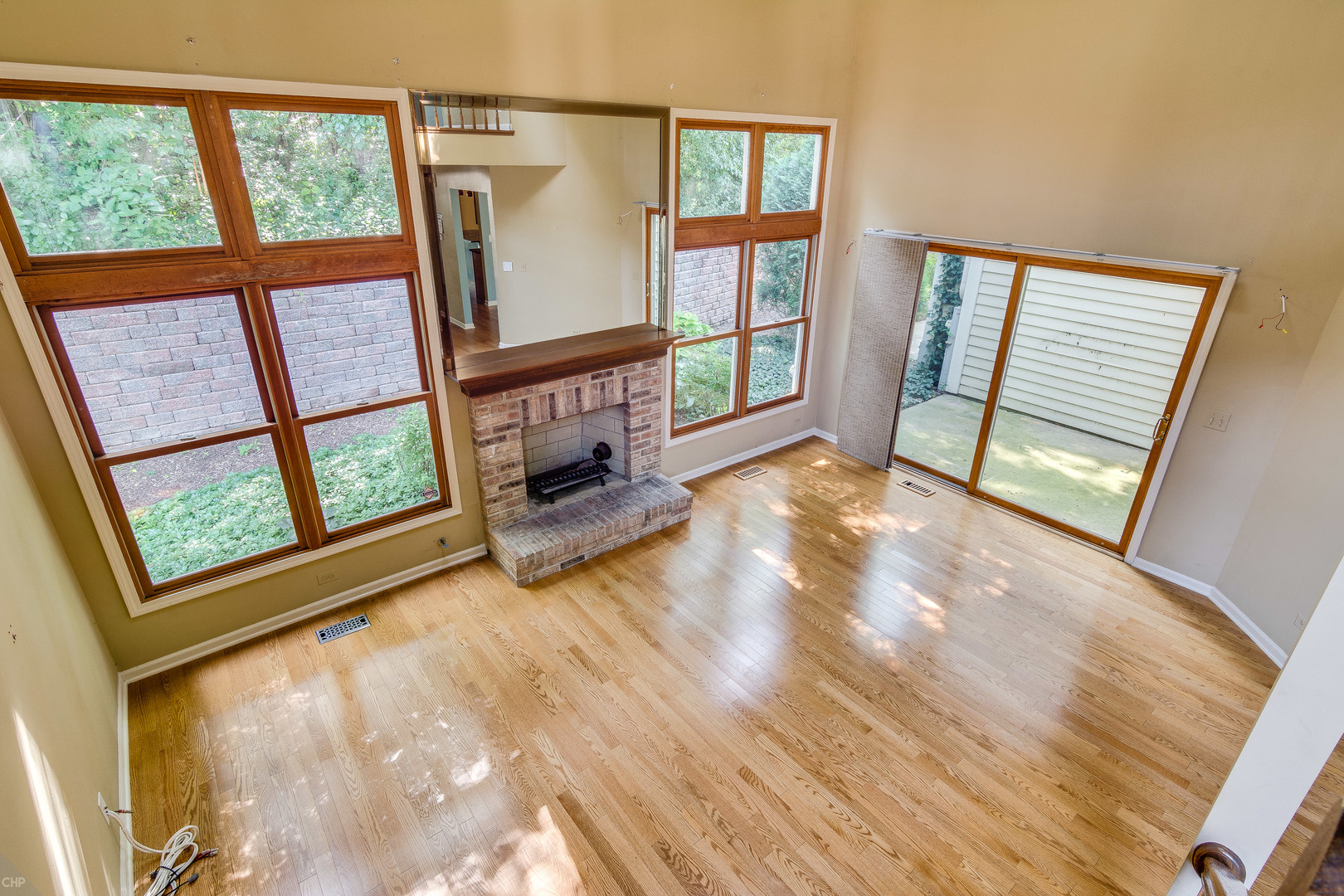 310 Spring Creek Circle Schaumburg, IL 60173 - Photo 24 of 26 a view of an empty room with large windows