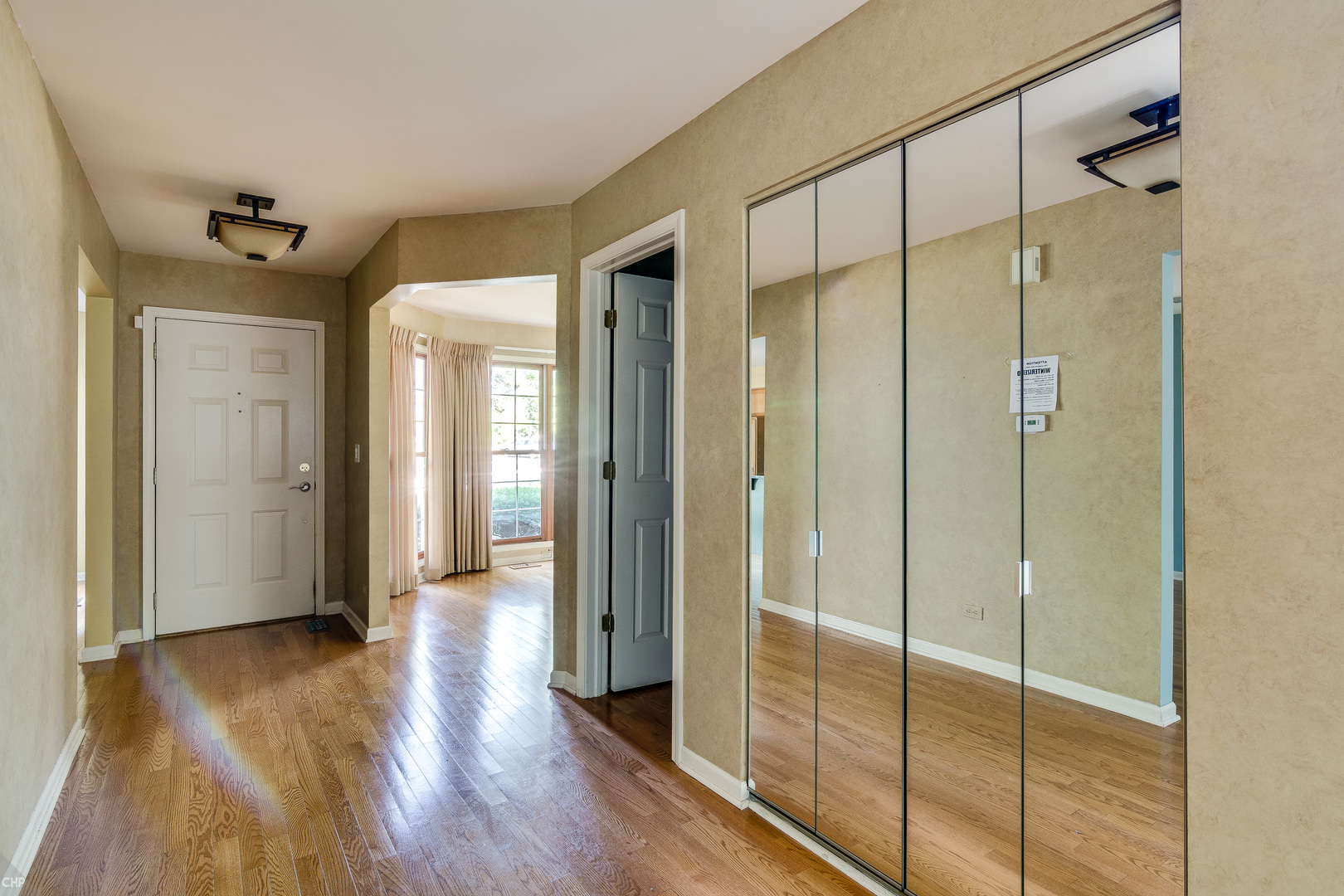 310 Spring Creek Circle Schaumburg, IL 60173 - Photo 5 of 26 a bathroom with a glass shower door
