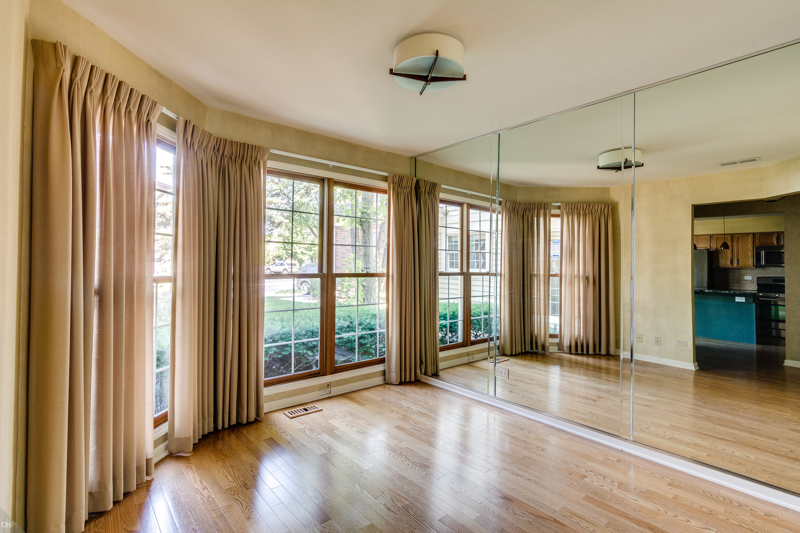 310 Spring Creek Circle Schaumburg, IL 60173 - Photo 6 of 26 a view of a room with large windows