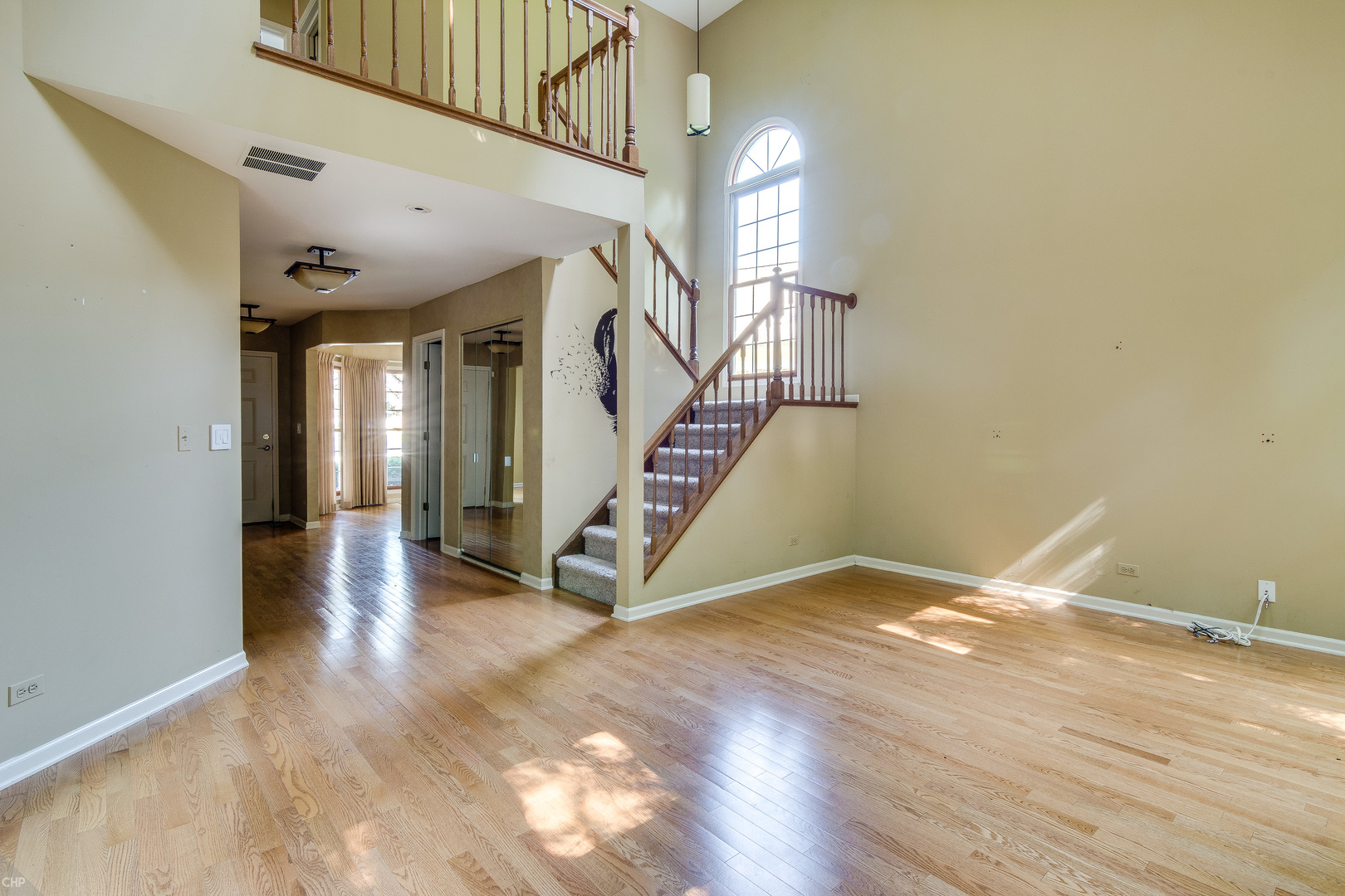 310 Spring Creek Circle Schaumburg, IL 60173 - Photo 10 of 26 a view of an entryway with wooden floor