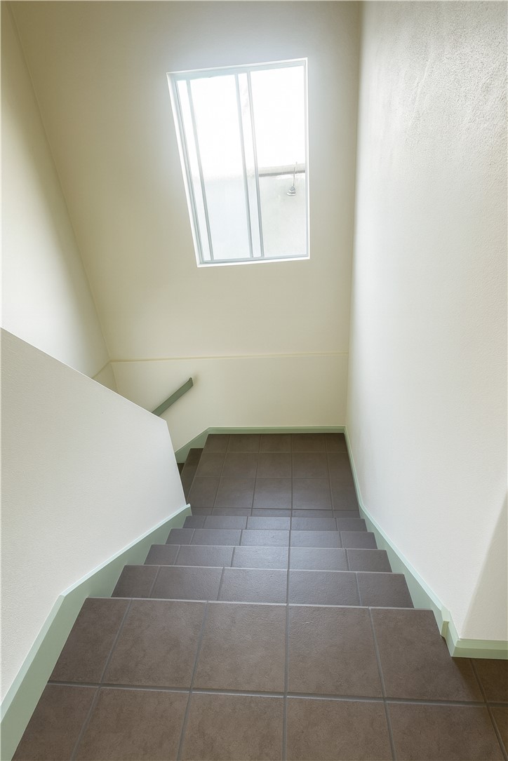 208 West Anaheim Street Long Beach, CA 90813 - Photo 43 of 53 an empty room with a white cabinet and a window
