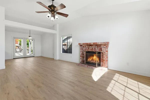 a view of an empty room and window