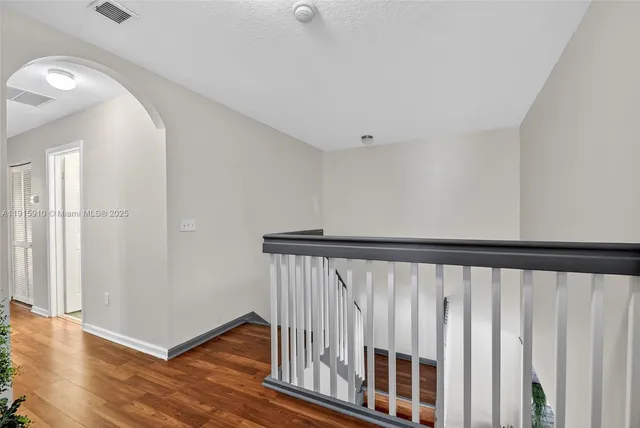 an aerial view of a house with a garden