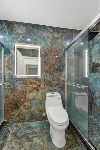 an aerial view of lake residential houses with outdoor space and lake view