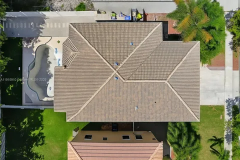 a bathroom with a sink a toilet and a window